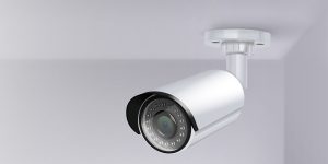 Video surveillance security cameras realistic composition camera hangs in the corner behind the top vector illustration